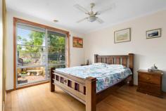 2 Ash Court Frankston North VIC 3200 $615,000 - $665,000 Located in one of the area's most exclusive cul-de-sacs, this three-bedroom home is a beacon of light-filled living, framed by the picturesque landscape of The Pines Flora and Fauna Reserve. Spanning an elevated 674sqm (approx.) block, it showcases professionally landscaped gardens that invite outdoor leisure and enjoyment. Greeted by an array of local wildlife, including echidnas and koalas from the rear reserve, this striking address harmoniously connects with its natural setting while offering a classic layout. It brings families together across two dedicated entertaining areas, separated by a central kitchen featuring all-original cabinetry, a combined oven/cooktop, and direct laundry access. Garden influences continue to permeate the interior, creating a serene atmosphere across three spacious bedrooms, while additional features include a main family bathroom with separate tub, gas ducted heating, evaporative cooling, and ceiling fans. Self-watering, low-maintenance, and environmentally friendly modern Australian rain garden with organic fruit trees link the home with a rear micro cabin and separate entertaining area with fireplace, highlighting the home's true indoor-outdoor living experience. With a rear northern orientation and convenient position only a short stroll from everyday conveniences, this impressive home sits within close proximity of Mahogany Rise and Aldercourt Primary Schools, Monterey Community Park, Carrum Downs Shopping Centre and Peninsula Link access.