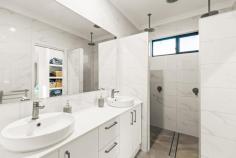53 Povah Road Bilingurr WA 6725 $899,000 Step into luxury, style, and functionality at this beautifully designed, modern 4-bedroom, 3-bathroom home in a sought-after location. Built in 2022, this standout standalone residence combines high-end finishes, thoughtful design, and an entertainer's dream outdoor setup - perfect for families, professionals, or anyone who values quality living. This stunning 627sqm property has been designed with modern luxury, flexibility, and entertaining in mind! The main residence boasts 3 generously sized bedrooms, including a luxurious master suite complete with his and hers walk-in robes, a double vanity, double shower, and separate toilet. 2 sleek bathrooms feature floor-to-ceiling tiles and an oversized freestanding bathtub this all flows seamlessly from the light-filled open-plan living, kitchen, and dining area which is the true heart of the home. The gourmet kitchen is beautifully appointed with a stone island bench, 900mm gas cooktop and oven, walk-in pantry, stone splash backs, and a large fridge recess. Premium fixtures and finishes feature throughout, along with full air-conditioning for year-round comfort. A detached poolside studio provides even more flexibility, offering a fourth bedroom or home office with its own full third bathroom. Perfect for guests or as a private retreat, it adds another layer of appeal to this already impressive home. The outdoor entertaining area is a true showstopper, featuring a covered alfresco with cedar-lined ceilings, epoxy resin flooring, and a BBQ zone with rangehood. A heated and cooled pool with a water feature forms the centerpiece of the backyard, and an integrated SONOS surround sound system connects seamlessly to the living areas for the ultimate indoor-outdoor lifestyle. Additional highlights include a full security system and the and something that every buyer is looking for... completely concreted side access leading to a large shed - perfect for storing a boat, caravan, or both - along with low-maintenance landscaping. Whether you're enjoying a peaceful evening by the pool, hosting family gatherings under the alfresco, or working from your private studio, 53 Povah Road offers a lifestyle second to none.