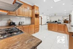 4 Livingstone Rise Lynbrook VIC 3975 $1,100,000 - $1,200,000 Every Child Gets Their Own Castle: Spacious Family Haven Discover the pinnacle of family living at 4 Livingston Rise, where this magnificent 40-square custom-built home sits in prestigious Lynbrook Heights, surrounded by pristine parklands on an exceptional 684 sqm (approx.) sanctuary. This is your family's gateway to Melbourne's most desirable family-focused community, where children thrive and parents enjoy unparalleled convenience. The thoughtfully designed residence welcomes you through an impressive foyer to the spacious master bedroom with bay window, walk-in robe, and private ensuite. The heart of the home flows seamlessly from generous family and dining areas into a fully enclosed alfresco space and expansive rumpus room, perfect for growing families. The gourmet kitchen, featuring granite benchtops, timber cabinetry, 900mm gas cooking, and walk-in pantry, becomes the natural gathering point, with a convenient second kitchen in the garage for effortless entertaining. Six generous bedrooms with built-in robes ensure everyone has their own personal retreat, complemented by family bathroom, powder room, and separate toilet. Year-round comfort comes through central heating, evaporative cooling, and quality window furnishings, while the double lock-up garage and garden shed provide practical storage. The location delivers true family magic. Lynbrook Heights positions you moments from excellent state and Catholic primary schools, with Lynbrook Shopping Centre's Coles, medical centre, and diverse dining just minutes away. Lynbrook Station provides seamless Melbourne CBD connectivity, creating perfect work-life balance. Children flourish with numerous parks, playgrounds, and the strong community spirit that makes neighbors lifelong friends. Ready to create your family's story? Don't let this opportunity pass by. Contact us today to arrange your private inspection and experience why Lynbrook Heights families never want to leave.