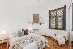 6 Waterhouse Rd South Plympton SA 5038 $875,000 to $910,000 From its classic façade complete with picket fence to gorgeous upgrades throughout, this 1925-built Bungalow maisonette is character meets contemporary in the very best way. Polished timber floorboards, original fretwork and sky-high ceilings line the entry, where both bedrooms are easily accessible, the master offering mirrored robes and a northerly-aspect outlook via big windows to the front yard. Upgraded with full-height tiling, shower over bath and pedestal vanity, the bathroom is just down the hall, with convenient separate toilet. Centrally positioned, a cosy formal lounge room enjoys a ceiling fan, split system air conditioner and ornamental open fireplace with mantle. Open, airy and renovated, the modern kitchen and meals space will delight cooks of the home with a gas cooktop, glass splashback, dishwasher, twin-door pantry, plenty of storage and a breakfast bar. Colonial-style French doors open onto a brilliant rear alfresco space, where a curved roof pergola with ceiling fan adds protection while still allowing natural light, and the outdoor kitchen with gas connection is ready for making year-round entertaining a piece of cake, all with the established and easy-care rear garden as your backdrop. More you'll adore: - Separate renovated laundry - Timber venetian blinds - Ceiling fan + ornamental fireplace to bedroom 2 - Remote lockable carport + off-street parking with drive-through access to rear garage - Raised garden beds with westerly aspect along driveway - Ducted evaporative cooling + gas heating - Close proximity to Emmaus Christian College You'll love the location, where local shops, cafes and hotels, bus and train transport, The Crescent Reserve and Edwardstown Oval are all within walking distance, and Castle Plaza Shopping Centre is just a few minutes' drive. Close to CBD and the sea and presented to perfection, this one will have a high appeal; come and check it out for yourself.