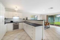 1A Culver Ave Sturt SA 5047 $795,000 to $845,000 In a wonderful location with no direct neighbours to the east, this contemporary 2002-built home is the perfect example of comfortable courtyard living. Three carpeted bedrooms begin with a beautiful front-positioned master capitalising on its northerly aspect with a bay window welcoming plenty of natural light, as well as a walk-in robe and ensuite bathroom. Bedrooms two and three are serviced by a central main bathroom with shower, inset bath and convenient separate toilet. A spacious tiled kitchen, living and dining space at the rear is open plan and airy, with big picture windows overlooking the backyard and a side courtyard space. A neutral U-shaped kitchen offers plenty of bench space, gas cooktop, raised breakfast bar and excellent storage, while sliding doors open onto a paved alfresco area perfect for entertaining outdoors. A securely fenced lawn backyard has ample room for little legs as well as scope for landscaping or adding a covered outside space. More to mention: - Built-in robes to bedroom 2 & study nook or storage provision to bedroom 3 - Ducted reverse cycle air conditioning throughout - Double lockup carport with drive-through & internal access + extra driveway parking - Excellent storage - Separate laundry with outside access Just minutes from the beach, Westfield Marion and Flinders University, with the bus, Flagstaff Hotel, local eateries and shops within walking distance and easy access to the CBD via the Southern Expressway, there's lots to love about the lifestyle this location has on offer. A superb investment, low maintenance live-in or affordable starter – this one will be popular, don't miss it.