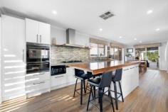 272 Skye Road Frankston VIC 3199 $830,000 - $900,000 Perfectly blending laid-back luxury with impressive functionality, this four-bedroom, two-bathroom home is an entertainer's dream, complete with expansive open-plan living, dual decks, and a striking solar-heated in-ground pool that sets the tone for unforgettable summer days. Step inside to a spacious interior where hybrid vinyl floors lead you through light-filled living and meals zones, all seamlessly connected to a designer kitchen featuring Bosch 5-burner gas cooktop, Electrolux oven, Akai dishwasher, and broad moveable island with timber benchtop and breakfast bar seating. LED downlights illuminate every corner with a warm, modern touch. The master suite offers a peaceful escape with its walk-in robe and private ensuite, while two of the three additional bedrooms include built-in robes. They share a sleek central bathroom with a full size tub, ideal for family functionality. Outside, the alfresco deck overlooks a visually striking pool, surrounded by low-maintenance landscaping perfect for all-weather entertaining. A second large covered timber deck overlooks the garden and kids' play area. A double carport with roller door access and an additional lock-up garage provides secure parking for three vehicles, in front, another two vehicles can be secured under shade sails behind an electric gate, complemented by a long driveway with ample off-street space for a further 2 vehicles. With ducted heating and evaporative cooling, a split system in the Lounge and another in the study/bedroom 4, a spacious laundry and tiled wet zones for everyday ease, this home is truly turn-key ready, perfect for families, entertainers, or anyone seeking a relaxed, high-quality lifestyle in a beautifully maintained setting. Perfectly positioned across from the prestigious Peninsula Kingswood Country Golf Club, this home offers a serene outlook and a coveted lifestyle setting. Families will appreciate zoning for McClelland Secondary College, with several local primary schools also nearby. Just minutes away, Karingal Hub provides everyday essentials, supermarkets, cinemas, and dining, while Bayside Shopping Centre in central Frankston offers even more retail variety. Frankston Beach and the vibrant waterfront precinct are also within easy reach, ideal for weekend relaxation. Nearby parks and nature trails, including George Pentland Botanic Gardens and McClelland Gallery & Sculpture Park round out this location's strong lifestyle appeal.