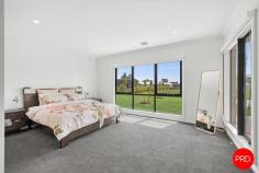 25 Blanchfield Drive Kyneton VIC 3444 $1,350,000 - $1,450,000 Set on a substantial allotment in a highly sought-after Kyneton location, this beautifully appointed residence delivers the perfect combination of modern style, functional design, and a lifestyle that embraces both indoor comfort and outdoor space. From the moment you step inside, the wide entry and light-filled interiors create an immediate sense of space, setting the tone for what's to come. The heart of the home is undoubtedly the expansive open plan kitchen, dining and living zone - designed with connection and comfort in mind. The living area flows effortlessly to the alfresco space, inviting year-round entertaining or easygoing afternoons with a good book and a glass of something local. The kitchen itself is a standout. At its centre, a generous stone-topped island offers the perfect perch for casual conversations or morning coffee rituals. Home cooks and entertainers alike will appreciate the quality appliances, plumbed fridge/freezer, soft-close cabinetry and abundant storage - all crafted for ease and style. The thoughtful layout means everything is within easy reach, whether you're cooking up a family feast or plating nibbles for guests. It's a kitchen that makes everyday tasks feel just a little more special. A thoughtful floor plan offers multiple living zones, including a formal lounge at the front and a versatile rumpus room, ideal for a kids' retreat or games space. Accommodation comprises 4 generous bedrooms, including a master suite with walk-in robe and private ensuite, while the remaining bedrooms are serviced by a stylish family bathroom. A dedicated study nook provides the perfect work-from-home solution. Outdoors, the property truly shines. Expansive lawns provide endless space for children, pets, and recreational activities, while the fire pit area offers a welcoming spot to gather on cooler evenings. The double garage, side access, and ample space for caravans or trailers further enhance practicality. Designed with modern efficiency in mind. Connected to town water, it features a powerful 33kW solar system complemented by three-phase power, ensuring reliable energy for the home and any additional needs. The all electric residence includes thoughtful upgrades such as electric ducted heating/cooling, induction cooking, a heat pump hot water system and energy-smart design that reduces running costs while maximising comfort. Located in a family-friendly pocket, just minutes from Kyneton's vibrant town centre, schools, parks, and V/Line services, this is a rare opportunity to secure a modern home on a large block without compromising on convenience. Key Features: • Four bedrooms plus study, two bathrooms, multiple living zones • Stylish kitchen with stone benchtops, large island, and walk-in pantry • Covered alfresco and fire pit entertaining area • Expansive block with side access, ideal for caravans, trailers, or sheds