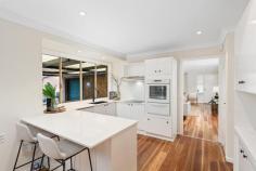 34 Eve St Narara NSW 2250 $1,100,000 - $1,200,000 Nestled in a quiet and convenient enclave of Narara, this solid brick-and-tile home offers a spacious and practical layout, perfect for growing families. Set on a generous 908sqm sun-drenched block, the home features five bedrooms and multiple living areas, giving every member of the family their own space while still bringing everyone together. With neutral tones throughout, complemented by timber touches, the home feels warm and inviting. Freshly painted and thoughtfully updated, it’s move-in ready, allowing you to settle in and enjoy immediately. At the heart of the home is the kitchen, designed to be both functional and central to family life. It seamlessly connects both the formal and casual living areas, creating the ideal setting for shared meals, entertaining, or simply enjoying everyday moments. The expansive rear yard, bathed in sunlight, offers a tranquil setting for children to play, parents to relax, and gardens to flourish. A covered alfresco area extends the living space outdoors, perfect for weekend BBQs or family gatherings. With local parks, a great selection of public and private schools, and all amenities, including Gosford waterfront & cafes within easy reach, this home offers the perfect balance of space, comfort, and convenience for families. Features include: – Neutral tones, fresh and inviting, a true family home on offer—freshly painted and thoughtfully updated, move-in ready. – Five bedrooms in total, with the master featuring built-in and walk-in robes, plus an updated ensuite; all bedrooms include ceiling fans for added comfort. – Modern kitchen with stunning stone benchtops, ample storage, and a crisp white colour scheme; featuring a brilliant breakfast bar, it’s the heart of the home—perfect for family and friends to gather and cook up a storm. – Freshly updated bathroom with sleek modern black finishes, a separate bath and shower, plus a separate toilet for added convenience. – Multiple living zones offering the perfect blend of formal and casual spaces with great separation, providing room for the whole family while seamlessly flowing to the outdoors. – Outdoors – space, space, and more space! Expansive covered alfresco flowing seamlessly from the indoors, perfect for all-season gatherings with family and friends or simply sitting back and relaxing. The huge, grassed, fully fenced rear yard is ideal for the kids and pets to run and play, and there’s plenty of room to kick the soccer ball around, add a pool (STCA), create veggie patches, or even put in a big shed for the hobbyist. With so much room to enjoy, you’ll love the endless possibilities this space offers! – Single lock-up garage with convenient drive-through access, offering additional parking and easy access to the alfresco area. Extras: NBN available, reverse cycle air conditioning, ceiling fans, timber flooring and fresh carpet throughout, and a garden shed at the rear. This home offers everything a growing family needs—space, comfort, and convenience, with room to make it your own. Located with a good option of both local and private schools and within easy reach of Gosford waterfront, cafes, hospitals, and the station with a bus at the end of the street. For the Sydney car commuters, for Sydney and Newcastle, the M1 is just a 10-minute drive. Don’t miss out on this rare opportunity to secure a family-friendly home in Narara.