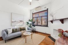 6 Waterhouse Rd South Plympton SA 5038 $875,000 to $910,000 From its classic façade complete with picket fence to gorgeous upgrades throughout, this 1925-built Bungalow maisonette is character meets contemporary in the very best way. Polished timber floorboards, original fretwork and sky-high ceilings line the entry, where both bedrooms are easily accessible, the master offering mirrored robes and a northerly-aspect outlook via big windows to the front yard. Upgraded with full-height tiling, shower over bath and pedestal vanity, the bathroom is just down the hall, with convenient separate toilet. Centrally positioned, a cosy formal lounge room enjoys a ceiling fan, split system air conditioner and ornamental open fireplace with mantle. Open, airy and renovated, the modern kitchen and meals space will delight cooks of the home with a gas cooktop, glass splashback, dishwasher, twin-door pantry, plenty of storage and a breakfast bar. Colonial-style French doors open onto a brilliant rear alfresco space, where a curved roof pergola with ceiling fan adds protection while still allowing natural light, and the outdoor kitchen with gas connection is ready for making year-round entertaining a piece of cake, all with the established and easy-care rear garden as your backdrop. More you'll adore: - Separate renovated laundry - Timber venetian blinds - Ceiling fan + ornamental fireplace to bedroom 2 - Remote lockable carport + off-street parking with drive-through access to rear garage - Raised garden beds with westerly aspect along driveway - Ducted evaporative cooling + gas heating - Close proximity to Emmaus Christian College You'll love the location, where local shops, cafes and hotels, bus and train transport, The Crescent Reserve and Edwardstown Oval are all within walking distance, and Castle Plaza Shopping Centre is just a few minutes' drive. Close to CBD and the sea and presented to perfection, this one will have a high appeal; come and check it out for yourself.