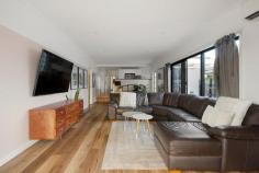 17A Duncan Avenue Seaford VIC 3198 $970,000 - $1,067,000 Beautifully upgraded to combine an impressive modern aesthetic with the most captivating features of its original design, this dual-level home will capture the heart of families who love to entertain. Boasting generous proportions, abundant storage solutions, and a secure outdoor sanctuary, it extends appeal with an address just moments from Long Island Beach and The National Golf Club. Immediately appealing with an invitation to relax across two distinct living zones, and entertain with its impressive kitchen featuring expansive stone benchtops, dual wall ovens and a large induction cooktop, the home opens to hardwood floors to welcome large families across its 4 bedroom, 2-bathroom design. Practical floating floors continue across the rear living zone, where sliding doors extend the fun across a large covered deck with feature outdoor tub (complete with hot and cold water). Sliding doors connect to the master bedroom, inviting a refreshing summer breeze into the light-filled space, which features 'his and hers' built-in robes and a beautifully renovated ensuite complete with walk-in shower. A large main bathroom with corner shower and separate tub services the remaining three bedrooms, while split-system heating and cooling and ceiling fans keep comfort throughout. A secure front native garden complements the rear outdoor space, with ample off-street parking found beyond a high front gate. Set within easy reach of Kananook Primary School, Wisewould Avenue Playground, Kananook Train Station, and Frankston's Bayside Shopping Centre.