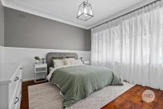 119 Morts Road Mortdale NSW 2223 This renovated two-bedroom home blends classic character with modern updates, making it an ideal choice for first home buyers or investors. Both generously sized bedrooms include built-in wardrobes, and the light-filled living area is fitted with heating for year-round comfort. A separate dining space with reverse cycle air-conditioning adds flexibility for family meals or entertaining. The spacious kitchen features an eat-in breakfast bar which flows directly to a covered deck, perfect for outdoor dining. The deck overlooks a level, west-facing backyard that enjoys plenty of sunshine. Wood panelling and polished floorboards maintain the home's charm, while practical features such as ample storage, a garden shed, and a lock-up garage add everyday convenience. With its quaint white picket fence, and neat lawns this home has an exceptionally welcoming street presence. Situated just a stone's throw from Olds Park and the bustling Mortdale shopping and transport hub, this home is a must-see for those seeking a lifestyle of comfort and convenience. Features • Two beds with BIRs, wood panelling and polished floorboards • Electric heated light-filled living room, separate dining with reverse AC • Expansive kitchen with eat-in breakfast bar, dishwasher, ample storage • Covered entertainers' deck flowing to a flat, west-facing yard • Linen press, garden shed, single lock-up garage • Inviting street presence; white picket fence and neat landscaping • Short walk to Olds Park & Mortdale Village shops, schools and transport