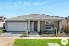 5 Bruhn Street Clyde Morth VIC 3978 $849,000 - $899,000 Beautifully crafted with a focus on comfort and quality, this stunning, brand-new east-facing home offers 25 squares of spacious, thoughtfully designed living. From the moment you step inside, the design reveals itself with a formal lounge - perfect for entertaining or a quiet retreat - before double doors lead you into the grand master suite. This retreat is appointed with His and Hers walk-in robes and a luxurious ensuite featuring a Caesarstone benchtop, freestanding bathtub, dual vanities, oversized shower, and a heated towel rail. A home office/study precedes the true heart of the home - a light-filled open-plan living and dining zone, seamlessly connecting to the undercover alfresco with extended decking. This outdoor haven is ideal for year-round entertaining, with ample space for children and pets. The chef's kitchen showcases Caesarstone benchtops, stone splashback, stainless steel appliances, a 900mm oven with gas cooktop, microwave and dishwasher, plus abundant storage and a walk-in pantry. A large linen cupboard and well-designed laundry add to the home's practicality. The private rear wing includes a second master-size bedroom, two additional bedrooms with built-in robes, a family bathroom with a stunning freestanding bathtub tub and a separate WC. UPGRADED INCLUSIONS • LED lighting - doubled in all rooms and living areas • Additional power points throughout • Double-glazed windows in all living areas and bedrooms • Evaporative cooling & Ducted heating • Blockout roller blinds & flyscreens • Heated towel rail and freestanding bathtub to main bathroom • Double vanity with special order floor-mounted spout and hand shower • 900mm oven & gas cooktop • Microwave oven and dishwasher included • Premium underlay (11mm Dunlop Imperial Plus) for carpet & laminate flooring • 2.7m ceilings and high internal doors LOCATION & LIFESTYLE When good schooling matters, Clyde Grammar is just a short walk away. With low-maintenance landscaping already completed, all that's left is to move in and enjoy.