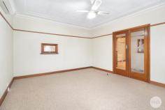 62 Albert Street Sebastopol VIC 3356 $515,000 Step back into a home that has been lovingly preserved since the 1960s, with so many original features still intact. This character filled property offers a rare glimpse of mid century charm, complete with nautical inspired patterned glass doors, a distinctive porthole window, high ceilings, and a classic servery window from the kitchen to lounge. Inside, the home is both spacious and inviting. All three bedrooms are generous in size, the bathroom remains in its original style yet entirely practical. The kitchen is the heart of the home, the kind where the dining table takes pride of place in the centre. With an abundance of cupboards and a warm welcoming feel, it's the kind of space that instantly feels like home. Set on an expansive block of approximately 768m², the property continues to impress outside. A covered alfresco area leads to a large paved courtyard, perfect for large potted plants and outdoor gatherings. Beyond this, you'll discover garaging, shedding, a bird aviary and a hidden garden at the rear. Perfectly located close to schools, shops, public transport and just minutes from the heart of Ballarat, this is a home brimming with personality, space, and potential.