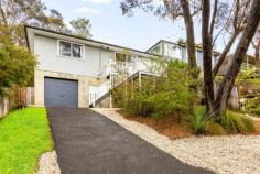 161 Great Western Highway Blackheath NSW 2785 $695,000 - $745,000 Although officially addressed on the Great Western Highway, this charming white brick and weatherboard clad cottage is actually accessed via the peaceful and private Kirkwood Street, which runs parallel to the main road. From the moment you arrive, the home offers instant street appeal and a surprisingly tranquil, elevated outlook - shielded from both the sights and sounds of the highway more than one might expect. Beautifully presented with a fresh, contemporary fitout, the property delivers immediate comfort, ideal for first-home buyers or investors alike. The open-plan living, dining, and kitchen area is filled with natural light and thoughtfully designed, featuring a discreet European-style laundry. The area is warmed by a well positioned wall heater. Centrally located between the three bedrooms is a bright, airy bathroom. The master bedroom and 2nd bedroom are appointed with floor-to-ceiling built-in robes, providing ample storage. From the kitchen, step out to the rear garden with its simple, tiered lawn areas, perfect for relaxing or light gardening. Underneath the home, a single garage offers secure parking and additional storage. Set on a manageable block of approximately 700sqm, this is a move-in ready property with little to do but unpack and enjoy. A wonderful opportunity to create your own private haven. Breakdown of Features: Secluded cul-de-sac position with entry via Kirkwood St Elevated perspective with single garage under house Open plan living, dining and kitchen; European laundry Well presented contemporary bathroom Master and 2nd bedroom with floor to ceiling built-in robes 3rd bedroom, which alternatively could be an ideal study Simple garden areas with potential to further enhance 1.3km to Blackheath Village shops and city train links