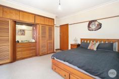 62 Albert Street Sebastopol VIC 3356 $515,000 Step back into a home that has been lovingly preserved since the 1960s, with so many original features still intact. This character filled property offers a rare glimpse of mid century charm, complete with nautical inspired patterned glass doors, a distinctive porthole window, high ceilings, and a classic servery window from the kitchen to lounge. Inside, the home is both spacious and inviting. All three bedrooms are generous in size, the bathroom remains in its original style yet entirely practical. The kitchen is the heart of the home, the kind where the dining table takes pride of place in the centre. With an abundance of cupboards and a warm welcoming feel, it's the kind of space that instantly feels like home. Set on an expansive block of approximately 768m², the property continues to impress outside. A covered alfresco area leads to a large paved courtyard, perfect for large potted plants and outdoor gatherings. Beyond this, you'll discover garaging, shedding, a bird aviary and a hidden garden at the rear. Perfectly located close to schools, shops, public transport and just minutes from the heart of Ballarat, this is a home brimming with personality, space, and potential.