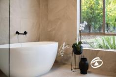 7 Heathdale Rd Narre Warren North VIC 3804 $2,150,000 - $2,350,000 A Lifestyle Like No Other on Half an Acre Set opposite expansive parklands with peaceful, unobstructed views, this remarkable half-acre property offers the ultimate in space, style, and family-friendly living. From the moment you arrive, you’ll be captivated by the beautifully landscaped front and rear gardens, creating a serene and private oasis for relaxation and entertaining. Inside, the home is equally impressive. Featuring four spacious bedrooms, including a master retreat, the residence has been thoughtfully updated with a renovated kitchen and modern bathrooms, blending functionality with contemporary style. The oversized garage provides ample storage or workshop space, while solar panels help keep energy costs low and sustainable. Step outside to discover your very own inground solar-heated pool, perfect for summer gatherings or quiet weekend swims, and a Plexipave tennis court, ideal for friendly matches or keeping active without leaving home. Every inch of this property has been designed for enjoyment, with expansive outdoor spaces and plenty of room for the whole family to explore. This exceptional property offers an incredible combination of space, luxury, and lifestyle. Rarely does a home provide such a seamless mix of indoor comfort and outdoor entertainment - this is truly a place to live, play, and create lasting memories.