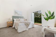 3/14B Brighton Street Frankston South VIC 3199 $780,000 - $850,000 Tucked peacefully at the rear of a boutique group, this beautifully presented, single-level sanctuary offers a relaxed lifestyle framed by leafy reserve views and superb indoor-outdoor flow, all within walking distance to Norman Avenue shops, stunning beaches, and zoned for coveted Frankston High School. Light-filled and spacious, the open-plan living and dining domain is anchored by a sleek stone-topped kitchen, complete with a Bellini gas cooktop and oven, Technika dishwasher, breakfast bar, and ample storage. Engineered timber flooring adds warmth and character, flowing seamlessly to a generous decked pergola, perfect for year-round alfresco entertaining or unwinding in total privacy. The well-zoned layout includes three robed bedrooms, including a tranquil master retreat with a walk-in robe, ensuite, and direct access to the backyard via elegant double French doors. A sparkling central bathroom with separate toilet services the remaining bedrooms, while a full laundry, ducted heating, split system cooling, and low-maintenance landscaping enhance everyday ease. Set on a generous allotment with a water tank, secure double garage and a versatile storage shed, this immaculate home delivers modern comfort and lifestyle appeal in a premium coastal setting.