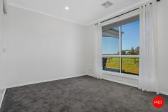 60 Market Street Newbridge VIC 3551 Set in the tranquil township of Newbridge, this stunning near-new residence offers a perfect blend of modern comfort and country charm. Positioned on a spacious 1,012sqm (approx.) allotment, the home features quality finishes, thoughtful design, and plenty of room for the whole family. The home's attractive façade, complete with wide frontage and neat landscaping, sets the tone for the stylish interiors within. Step inside to discover three generous bedrooms with built-in robes, including the master suite boasting a walk-in robe and a luxe ensuite with dual shower heads and premium fittings. At the heart of the home, the open-plan kitchen, dining, and living zone is filled with natural light. The kitchen features shaker-style cabinetry, black fittings, quality appliances, and a walk-in pantry with additional bench space and storage. Glass sliding doors open from the dining area to the rear yard, creating an effortless indoor-outdoor connection for entertaining. A second living room at the front offers a private retreat for quiet evenings or family gatherings. The main bathroom includes a deep bathtub, walk-in shower, and contemporary vanity, while a practical laundry with extra storage ensures everyday functionality. Comfort is assured year-round with ducted heating and cooling throughout. Outside, the level block offers excellent space for kids to play, pets to roam, or future improvements such as a shed, workshop, or landscaped gardens (STCA). Two large water tanks, secure fencing, and a double garage with internal access complete the package. Enjoy the peace of country living just a short walk to the Loddon River and local facilities, with Bendigo's CBD an easy drive away. Key Features: • Modern 3-bedroom, 2-bathroom home on 1,012sqm (approx.) • Designer kitchen with walk-in pantry and quality appliances • Two spacious living zones for family flexibility • Secure fencing, large water tanks, and double garage • Peaceful Newbridge location within easy reach of Bendigo