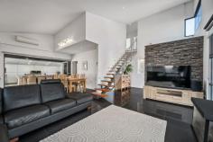 11A William Ave Henley Beach South SA 5022 $1,495,000 to $1,595,000 Perfectly positioned in a sought after seaside location, this freestanding Torrens Title courtyard home blends contemporary design with low maintenance ease, just a short stroll from the beach, Linear Park, and Henley Square. Behind its striking contemporary façade, the home unfolds over two levels, offering flexible living options to suit families, professionals, or downsizers. On the ground floor, the open plan casual living and dining includes a well equipped kitchen, flowing seamlessly via café doors to an extensive outdoor entertaining ideal for relaxed weekends and vibrant get togethers all year round. A versatile studio or home office, equally suited as a fourth bedroom or second living option, also sits on the lower level, along with a powder room and laundry. Upstairs, a statement staircase with open timber treads leads to three spacious bedrooms. The master bedroom boasts a built-in robe and private ensuite, while bedrooms two and three both feature built-in robes and are serviced by a stylish main bathroom with full height tiling plus separate toilet. Other features you'll love: • 351 sqm Torrens Title allotment • Huge automatic double garage with 2700 mm tilt door and additional storage • Reverse cycle air conditioning throughout for year-round comfort • Ducted vacuuming system for convenience • Soaring raked ceilings • Gas wood log fire in the living room The local lifestyle is enhanced with easy walking access to the Torrens Linear Park, beaches, and the vibrant dining and shopping precinct of Henley Square, and it falls within the sought-after Henley High School zone. A truly exceptional entertainer and a rare opportunity to secure a contemporary, low maintenance home in one of Adelaide's premier coastal suburbs.