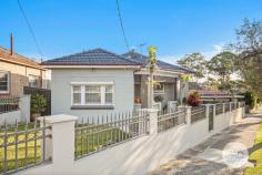 21 Henderson Road Bexley NSW 2207 Families looking to acquire a fully renovated and low-maintenance home directly opposite Bexley Park will be instantly impressed by this smartly modernised full-brick residence. Set on a very accessible and wide-fronted corner block, it offers a premium buying opportunity with fresh, bright and breezy interiors, quality contemporary finishes and an easy-to-maintain landholding, complete with secure parking for multiple cars. It also has the added convenience of being within walking distance to bus connections, parks, popular schools, local cafes and just a few minutes to Hurstville CBD. *Updated and refreshed throughout and featuring good natural light *A very workable floorplan includes separate lounge and family areas *Renovated dine-in kitchen comes with gas cooking and a dishwasher *Three bedrooms, timber floors, air-conditioning and two bathrooms *Family room easily converted to a fourth bedroom *Sunny and secure grassed gardens at the front and side of the home *A lock-up garage plus a carport *Side driveway through to a second lock-up garage and storeroom *Dual street access and extra-wide frontage *Quick and easy access to Bexley Aquatic Centre and Westfield Hurstville