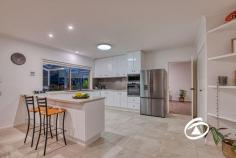 7 Heathdale Rd Narre Warren North VIC 3804 $2,150,000 - $2,350,000 A Lifestyle Like No Other on Half an Acre Set opposite expansive parklands with peaceful, unobstructed views, this remarkable half-acre property offers the ultimate in space, style, and family-friendly living. From the moment you arrive, you’ll be captivated by the beautifully landscaped front and rear gardens, creating a serene and private oasis for relaxation and entertaining. Inside, the home is equally impressive. Featuring four spacious bedrooms, including a master retreat, the residence has been thoughtfully updated with a renovated kitchen and modern bathrooms, blending functionality with contemporary style. The oversized garage provides ample storage or workshop space, while solar panels help keep energy costs low and sustainable. Step outside to discover your very own inground solar-heated pool, perfect for summer gatherings or quiet weekend swims, and a Plexipave tennis court, ideal for friendly matches or keeping active without leaving home. Every inch of this property has been designed for enjoyment, with expansive outdoor spaces and plenty of room for the whole family to explore. This exceptional property offers an incredible combination of space, luxury, and lifestyle. Rarely does a home provide such a seamless mix of indoor comfort and outdoor entertainment - this is truly a place to live, play, and create lasting memories.