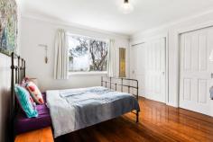 161 Great Western Highway Blackheath NSW 2785 $695,000 - $745,000 Although officially addressed on the Great Western Highway, this charming white brick and weatherboard clad cottage is actually accessed via the peaceful and private Kirkwood Street, which runs parallel to the main road. From the moment you arrive, the home offers instant street appeal and a surprisingly tranquil, elevated outlook - shielded from both the sights and sounds of the highway more than one might expect. Beautifully presented with a fresh, contemporary fitout, the property delivers immediate comfort, ideal for first-home buyers or investors alike. The open-plan living, dining, and kitchen area is filled with natural light and thoughtfully designed, featuring a discreet European-style laundry. The area is warmed by a well positioned wall heater. Centrally located between the three bedrooms is a bright, airy bathroom. The master bedroom and 2nd bedroom are appointed with floor-to-ceiling built-in robes, providing ample storage. From the kitchen, step out to the rear garden with its simple, tiered lawn areas, perfect for relaxing or light gardening. Underneath the home, a single garage offers secure parking and additional storage. Set on a manageable block of approximately 700sqm, this is a move-in ready property with little to do but unpack and enjoy. A wonderful opportunity to create your own private haven. Breakdown of Features: Secluded cul-de-sac position with entry via Kirkwood St Elevated perspective with single garage under house Open plan living, dining and kitchen; European laundry Well presented contemporary bathroom Master and 2nd bedroom with floor to ceiling built-in robes 3rd bedroom, which alternatively could be an ideal study Simple garden areas with potential to further enhance 1.3km to Blackheath Village shops and city train links