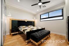 80 Golding St Beverley SA 5009 Bringing together space, style and comfort, this four-bedroom, three-bathroom residence is designed for modern family living. Built in 2023, it combines soaring 3m ceilings, a versatile floorplan and quality inclusions to create a home of both elegance and ease. From the outset, the home makes an impression. A wide timber front door opens to an elegant entry hall where timber-panelled ceilings and feature lighting set the tone. A lounge at the front offers a quiet retreat, while the rear unfolds into a breathtaking open-plan hub. Here, coffered ceilings, custom cabinetry and a built-in bar frame the showpiece kitchen, dining and living areas — the true heart of the home. The kitchen balances style and practicality with a 60mm stone waterfall island, Bosch appliances and sleek soft-close cabinetry. A full butler’s pantry adds further convenience, fitted with a 900mm gas cooktop, twin sink, dishwasher and extensive storage, while the front kitchen features an additional 900mm electric cooktop — ideal for the home chef who wants it all. For those who love to entertain, stacker doors open to a covered alfresco complete with a built-in outdoor kitchen, creating the perfect setting for year-round gatherings. Across both levels, the home offers four generous bedrooms and three well-appointed luxurious bathrooms, including a master suite with walk-in robe, ensuite. 80 Golding Street is a residence that blends refined design with everyday ease — a stylish home designed to impress at every turn. Features you’ll love: • Fortune living design • 19.2kw solar panels with 15kw inverter • Smart home technology can be controlled from your phone • All windows and doors fitted with heavy duty electric remote controlled roller shutters (can be controlled via your phone) • Security system hardwired throughout with phone monitoring • Secure perimeter fencing with smart lock that incorporates an electric slider over the driveway • Double garage with automatic door • 18kw Daikin ducted A/C with Air touch tablet and • Stylish ceiling fans in all living areas and bedrooms • Double glazed windows • Large timber door upon entrance with Samsung automatic door lock • 3m high ceilings and 2.7m high doors • Feature pendant lighting to staircase, living and kitchen • Statement entry passage with divine timber panelled ceilings • Large luxe tiling on the lower level and flash hybrid timber floors above • Commercial grade stacker sliding doors • Coffered ceiling to open plan area • Kitchen with waterfall 60m stone bench top • Westinghouse 900mm gas cook top, double basin, stone tops and splash backs to butler’s pantry • Additional brand-new Bosch 900m electric stove top and never been used Bosch oven • Bosch integrated microwave • Fan-cooled covered alfresco entertaining patio • Covered outdoor entertaining terrace with built-in Matador BBQ station • Ample storage throughout including understairs storage in garage • Custom cabinetry and bar with bar fridge • Built in TV unit with 60m stone top • luxurious bathrooms with floor to ceiling tiling walk in showers with waterfall shower heads, LED back lit mirrors, floating vanities and matt black tapware • Guest bathroom with twin vanity, bathtub and shower along with separate WC • Mirrored BIR to beds 2,3 and 4 • Master bedroom with spacious WIR and deluxe ensuite • Spacious study nook • Laundry with provisions for washer and dryer. Access into garage, rear living area & patio • Low maintenance synthetic turf to front and rear • Sensor lights to front of home • Timber cladding to front of home Nearby Attractions & Entertainment: • Henley Beach, Grange Beach and the CBD both around 10 minutes from home • Nearby reserves include Colins Reserve, Skate Park as well as Lewanick Reserve with playground, tennis courts and basketball courts • Adelaide Entertainment Centre and North Adelaide nearby • Adelaide 36ers Arena footsteps away • Grange Golf Club Shopping & Local Conveniences: • Brickworks Marketplace and Drakes Allonby Gardens close by for everyday needs • Sushi Train • Plant 4 Bowden with markets, cafés and community events • Adelaide Airport just a 9-minute drive from home • Harbour Town, Bunnings and IKEA all within 10 minutes • Westfield West Lakes just a short drive for major retail, dining and entertainment Restaurants, Bars & Cafés: • 94 West • Chicco Palms • Aye Frank • Lockleys Hotel • Alby’s Gluten Free Bakery • Joe’s Pizza Bar • The Bartley Hotel and Café Palazzo in nearby suburbs for added variety Schooling: • In the school catchment zone for Findon High and Allenby Gardens Primary • Minutes to Woodville High, Underdale High, Seaton High and Adelaide High. As well as Kilkenny Primary, Flinders Park Primary, Torrensville Primary. • Nearby private schools, St Michaels, St Francis, Nazareth College.