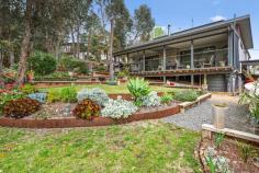 3 Anchorage Way Goughs Bay VIC 3723 $960,000 - $1,050,000 Discover an unparalleled lifestyle at this captivating lakeside property in picturesque Goughs Bay. Combining modern comfort, vibrant design, and the beauty of nature, it's the perfect place to relax, entertain, and enjoy life by the water. Step inside and you're welcomed by a sense of space and contemporary style, with soaring clerestory windows and glass doors flooding the home with natural light. The kitchen is a true standout, showcasing bold red subway tiles, quality appliances, and a generous island bench - perfect for casual meals or entertaining. The living room completes the picture, inviting you to unwind by the wood fire on cooler evenings, or step straight outside when the sunshine calls. Accommodation is thoughtfully designed, offering three spacious bedrooms. The master enjoys its own private retreat upstairs, complete with a walk-in robe, ensuite, and a dedicated living area that flows onto a deck - an ideal spot to soak in the sweeping lake views. Outdoors, the lifestyle continues with a tranquil setting overlooking the beautifully landscaped gardens and surrounding mountains. Picture mornings with coffee on the deck, evenings entertaining friends and family, and plenty of room for all the toys with ample parking for cars, a caravan, and even the boat. At the rear, gated access to a reserve leads to a lock-up shed, perfect for storage or tinkering. Adding to the magic, friendly kookaburras visit daily, reminding you that you're immersed in nature. Perfectly positioned to enjoy all that Goughs Bay has to offer - from boating and fishing to hiking and exploring - this property is more than a home, it's a lifestyle.