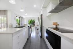 23 Bellatrix Street Reedy Creek QLD 4227 $1,799,000 Perfectly poised on an elevated block, 23 Bellatrix Street blends modern design with effortless liveability. Sunlit interiors flow from the kitchen—the natural hub of the home—through open-plan living and dining to a private, covered alfresco, creating a seamless setting for weeknight dinners or weekend entertaining. The oversized master suite provides a quiet retreat with generous storage, while three additional bedrooms offer flexibility for kids, guests or a dedicated home office. With a double lock-up garage, low-maintenance landscaping and a near-new presentation throughout, it's a genuine turn-key opportunity. Set in peaceful Reedy Creek, the address places you moments from parks, walking trails and the conveniences of Robina Town Centre, with quick M1 access for easy commuting. Families will value the proximity to some of the Coast's most respected schools—Hillcrest Christian College and King's Christian College are within easy reach, with Somerset College, Marymount and Bond University also nearby—making school runs simpler and after-school activities a breeze. Weekends are just as appealing with world-class beaches, sporting facilities and community amenities all close at hand. Beyond lifestyle, the property offers clear upside for the future. The elevated position captures breezes and outlook, the low-maintenance design keeps running costs down, and the versatile four-bedroom layout broadens appeal for both owner-occupiers and tenants—promising strong demand over time. Whether you're upsizing, right-sizing or seeking a quality investment in a high-growth pocket, this home delivers comfort now and confidence for what's ahead. Move straight in and start enjoying the best of Reedy Creek living—space, sunlight and exceptional convenience, all on your doorstep. Key features - Four bedrooms including large master retreat - Light, bright interiors and open-plan living - Undercover alfresco area for easy entertaining - Elevated block capturing breezes and outlook - Double lock-up garage; low-maintenance yard - Quality, near-new condition—move straight in - Close to leading schools, parks, shops and transport