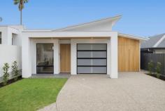 7 Waverley St Mitcham SA 5062 $2,450,000 - $2,650,000 Nestled in one of Adelaide's most sought-after suburbs, this brand-new designer home offers comfort, elegance, and a lifestyle many dream of. As you enter, sunlight pours through expansive windows, illuminating every corner and highlighting the home's high-end finishes. A grand hallway with a quiet study area provides the perfect space for working from home. The master suite is a peaceful retreat, complete with a large built-in robe, elegant dressing table, and beautifully appointed ensuite. Two additional bedrooms, each with built-in robes, ensure everyone has their own space, while a flexible second living room or fourth bedroom, offers options for family or guests. The central main bathroom features elegant finishes, a large shower and bath, and a separate toilet and basin, while a separate laundry provides convenient access to the outdoors. At the heart of the home is a stunning open-plan living area with a stylish gas fireplace and built-in cabinetry, seamlessly connecting the dining and kitchen zones. The kitchen is designed for both everyday living and entertaining, featuring a stone island bench, double oven, induction cooktop, abundant storage, and a butler's pantry with prep space and a secondary sink. Features not to be missed: • Intercom • Ducted reverse-cycle zoned air conditioning • Solar panels 13.2kw • In-ground swimming pool • Herringbone floorboards in all main areas • Built-in bar nook • Stone benchtops throughout • Built-in outdoor kitchen • Security system Step outside to your alfresco haven, complete with an outdoor kitchen featuring an inbuilt BBQ, sink, and storage. Enjoy summer nights entertaining while overlooking the sparkling in-ground pool and beautifully landscaped rear yard. Located just 7 km from Adelaide's CBD with easy access to the Adelaide Hills, Mitcham offers a leafy, family-friendly lifestyle. Excellent nearby schools, shops, cafes, and Mitcham Square provide convenience, while parks and scenic reserves offer a touch of nature. This is more than a house, it's a home designed for families or those seeking a low-maintenance lifestyle with space to grow, entertain, rest, and enjoy the very best of Mitcham living.