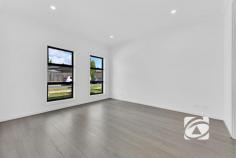 99 Athletic Cct Clyde VIC 3978 $680,000 - $748,000 Discover the perfect blend of contemporary comfort and thoughtful design in this brand-new residence, ideally suited for first-time buyers, astute investors, or those seeking a more manageable lifestyle. This impeccably crafted home welcomes you with four generously proportioned bedrooms, headlined by a luxurious master suite complete with a walk-in robe and private ensuite. The remaining three bedrooms feature built-in robes and are conveniently serviced by a stylish main bathroom and separate toilet. The heart of the home showcases a seamlessly integrated open-plan living space, where the lounge, dining, and kitchen areas flow effortlessly together, creating an inviting atmosphere for both everyday living and entertaining. The modern kitchen is a true highlight, boasting quality appliances, elegant stone benchtops, and abundant storage to meet all your culinary needs. Climate control is effortless year-round with central ducted air conditioning, while contemporary downlights illuminate every corner. A spacious laundry and low-maintenance backyard ensure practicality remains paramount, complemented by a single car garage with secure internal access. Located in the sought-after Pavilion Estate, this home positions you within easy reach of Casey Fields, reputable schools, childcare facilities, and other amenities. Families will appreciate the abundance of walking paths, playgrounds, parks, and sporting amenities right at your doorstep. This exceptional property represents outstanding value in today's market, offering a lifestyle defined by comfort, convenience, and contemporary appeal. Don't let this opportunity pass you by—arrange your private inspection today and experience firsthand what makes this residence truly special.