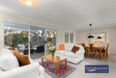 45 Strawberry Hill Dr Gidgegannup WA 6083 $1,000,000 Set amongst a landscape of gently contoured pastures and majestic gums, this two-storey Ross Squires home is a rural idyll writ large, offering a rare opportunity for fellow equestrian enthusiasts to continue a passionate legacy of horsemanship. As you arrive at the fully fenced property and approach the north-facing front door, a sense of calm descends—a feeling that only deepens as you discover the thoughtful marriage of contemporary architecture with serious equestrian infrastructure. 4 bedrooms 2 bathroom 2011-built Hardi and iron Open plan living/kitchen First-floor junior zone Barn, stable, tack, feed Round yard & arena 8 paddocks & wash bay Rainwater tanks & bore 4.94-acre pasture perfect Rural luxury horse haven Step inside, and your eyes are immediately drawn to the lush rural views framed by large windows and a sliding glass door that opens to the paved alfresco entertaining area, set under the main roof. This blissful outdoor living and entertaining space is edged with a drought-tolerant sand garden planted in a series of Corten steel beds, creating a sophisticated transition between interior comfort and the pastoral beauty beyond. Large tiles extend across much of the ground floor plan, their light, neutral tone bringing a sense of cohesion and a flexible backdrop to the embellishments of your life, whether that includes muddy riding boots or elegant dinner parties. To the right of the central living zone is a meals area and kitchen that speaks to both daily practicality and weekend entertaining. The kitchen, a modern delight, uses a limited palette of materials in predominantly soft white tones. Stone benchtops and an embarrassment of overhead and under-bench storage – including appliance nooks –surround the electric oven, four-burner gas hob and dishwasher. A corner window dressed in plantation shutters frames glimpses of surrounding paddocks, ensuring that even whilst preparing meals, the connection to the equestrian landscape remains unbroken. Judiciously positioned on the ground floor, away from the hustle and bustle of the junior bedrooms, the principal suite sits at the east end of the plan with a sliding door to the verandah, a sizeable walk-in robe and dressing room, and a fully tiled ensuite with a double shower, a central vanity with stone top and a separate WC. Split air conditioning delivers year-round comfort. A powder room and walk-through laundry with a wall of built-in storage complete the layout of the ground floor. Timber stairs ascend to the first floor, a fantastic space for children where three bedrooms open off a generous central living room with access to a south-facing balcony. Each of the junior bedrooms is carpeted and fitted with mirrored robes, with one opening to a private balcony and views towards Susannah Brook that will inspire young riders’ dreams of adventure. A treetop home office with built-in storage and a spectacular cathedral window hums with ample light and delightfully distracting views. The perfect space for homework, managing family admin, or simply watching the dancing canopy of majestic gums. The current owner, a passionate horsewoman, has developed and maintained a suite of facilities that represent a serious commitment to equine pursuits. Eight paddocks, the majority of which have electric fencing, and two with shelters, provide flexible grazing and turnout options. At the same time, powered stables with two four-metre by four-metre stalls, covered walk-out yards, a feed and tack room, and a wash-down bay with a dedicated hot water supply offer both horse and rider superior accommodation. The arena and round yard complete a setup that speaks to dedication and understanding of equestrian needs – this is infrastructure built by someone who truly knows horses. Avalon built both the stables and the drive-through barn, with the latter featuring high clearance for float storage, a bathroom/laundry with a heavy-duty machine for washing horse rugs, and a small kitchenette which opens onto a paved. A 9×6-metre garage provides secure parking and extra storage, complementing the equestrian facilities and adding to the property’s practicality. Surrounded by properties of a similar size and neighbours with an equine bent, Strawberry Hill offers a rural escape within easy reach of both Mundaring and Midland, just 30 minutes from the airport and a commutable 40 minutes from the Perth CBD. This ensures that while you enjoy the peace of country living, urban amenities remain accessible. Rainwater tanks with a filter at the house, rainwater tanks at the stable complex, and a bore with a small tank give you peace of mind in the Australian climate, as does the fire suppression system on the roof. This is a property where every detail has been considered, not just for comfortable living, but for the specific needs of those whose lives revolve around horses. It understands that the view from the kitchen window is made infinitely more beautiful by horses grazing in the morning light.