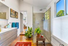 5 Dulhunty Street Katoomba NSW 2780 Step into a piece of history with this charming 1914 weatherboard home, presented to the market for the first time in 85 years. Nestled on a coveted street in South Katoomba, just moments from the escarpment, this property radiates warmth, character, and a profound sense of place - an enduring legacy in one of the Blue Mountains' most treasured locations. The home showcases a versatile floorplan, currently arranged to include four generously proportioned bedrooms, a central bathroom, an elegant lounge, a sun-drenched sitting room, and a separate dining area. Thoughtful and sympathetic renovations have elevated the home's comfort while preserving its original charm. The kitchen boasts stone benchtops and a five-burner gas cooktop - ideal for hosting and everyday living. Custom panoramic double glazing in the rear sitting and dining rooms frames the breathtaking north-facing garden, seamlessly blending indoor and outdoor living and flooding the interiors with natural light. Beyond the main residence lies a private, self-contained retreat - perfect for guests, extended family, or creative pursuits. The garden is a true haven: expansive, sunlit, and lovingly landscaped with recycled brick paths, fruit trees, and a majestic 100-year-old late-leafing chestnut tree. A delightful chicken coop with a generous run enhances the mountain lifestyle, while an artist's studio nestled among the greenery offers a tranquil space for inspiration or quiet reflection. The original cast iron bathtub amongst the Spring bluebells is the perfect place to unwind at the end of the day. This is not just a home, it's a lovingly preserved legacy - a place where history, romance, nature, and creativity converge in one of Katoomba's most sought-after locations. Whether you're dreaming of a peaceful family home or a weekend escape, 5 Dulhunty Street is a property to fall in love with. Key features: Gas heating, full insulation (walls, floors, ceilings), and a new roof for year-round comfort and thermal retention. Double glazed windows and doors from Against the Grain and restored original cedar windows with hand blown ripple glass retained to street façade. A self-contained retreat retaining original cedar sunroom windows with Kosciusko glass providing both light and privacy Expansive north-facing garden with artist's studio, chicken coop, and 100-year-old chestnut tree Restored external verandahs and large rear deck with spotted gum decking Ample under-house and roof storage with attic ladder access Façade restored to original Arts and Crafts design Edna Walling-inspired ironstone garden beds and original tennis court retaining walls Premium location with filtered views across the Gully Reserve to the valley