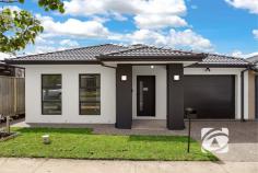 99 Athletic Cct Clyde VIC 3978 $680,000 - $748,000 Discover the perfect blend of contemporary comfort and thoughtful design in this brand-new residence, ideally suited for first-time buyers, astute investors, or those seeking a more manageable lifestyle. This impeccably crafted home welcomes you with four generously proportioned bedrooms, headlined by a luxurious master suite complete with a walk-in robe and private ensuite. The remaining three bedrooms feature built-in robes and are conveniently serviced by a stylish main bathroom and separate toilet. The heart of the home showcases a seamlessly integrated open-plan living space, where the lounge, dining, and kitchen areas flow effortlessly together, creating an inviting atmosphere for both everyday living and entertaining. The modern kitchen is a true highlight, boasting quality appliances, elegant stone benchtops, and abundant storage to meet all your culinary needs. Climate control is effortless year-round with central ducted air conditioning, while contemporary downlights illuminate every corner. A spacious laundry and low-maintenance backyard ensure practicality remains paramount, complemented by a single car garage with secure internal access. Located in the sought-after Pavilion Estate, this home positions you within easy reach of Casey Fields, reputable schools, childcare facilities, and other amenities. Families will appreciate the abundance of walking paths, playgrounds, parks, and sporting amenities right at your doorstep. This exceptional property represents outstanding value in today's market, offering a lifestyle defined by comfort, convenience, and contemporary appeal. Don't let this opportunity pass you by—arrange your private inspection today and experience firsthand what makes this residence truly special.