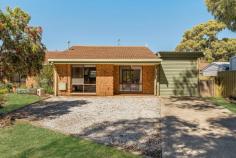 Unit 6/13 Windsor Ave Clovelly Park SA 5042 $620,000 - $660,000 Positioned at the end of the group with a private driveway, this tidy two-bedroom homette presents as a brilliant first buy or investment. Set back from the road with plenty of driveway and yard space, an open living, dining and kitchen space upon entry welcomes plenty of natural light An exposed brick feature wall contrasts with a contemporary kitchen renovation, where home cooks will find plenty of inspiration amid substantial storage space, a dishwasher, induction cooktop, dishwasher, functional U-shape design with breakfast bar and crimson glass splash back. Two bedrooms are separated by a central bathroom with inset bath, shower and updated vanity and tapware; a front-positioned master enjoying beautiful natural light with a street outlook as well as mirrored built-in robes and ceiling fan. Outside, a covered porch area overlooks a paved alfresco space with shade sail, surrounded by a securely fenced lawn space sure to surprise with its size. The finer details: - Ducted evaporative air conditioning - Gas heater to lounge - Separate laundry - Separate toilet - Roller door carport - Gated side access - Garden shed Take your pick of local reserves within walking distance (Byron Avenue Reserve, Shaun's Playground, Mitchell Park Oval) as well as the bus and train, and Marion Hotel & Cellars, local schools, shops, Westfield Marion and the Tonsley district at your fingertips.