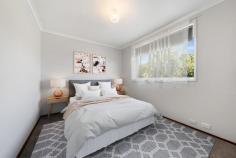 18 Pattinson Crescent Flynn ACT 2615 Nestled in the heart of Flynn, this stunning four-bedroom ensuite residence at 18 Pattinson Crescent is the perfect haven for families seeking comfort, convenience, and style. Set on a generous 887 sqm block, the property harmoniously blends modern living indoors with ample outdoor space for the whole family to enjoy. As you approach the front door, the home's elevation and views of the majestic Brindabellas and the vibrant Belconnen district will captivate you. Step inside to experience the warmth of polished Australian hardwood floors and a soft neutral decor that enhances the inviting ambiance. Abundant natural light floods the expansive living and dining areas, thanks to large windows framing the breathtaking scenery and providing a delightful backdrop for relaxation. These spaces flow seamlessly into the heart of the home: a beautifully renovated kitchen. This stylish kitchen features stone benchtops, generous storage, and a convenient breakfast bar, making it ideal for busy families. This lovely residence includes four spacious bedrooms, each equipped with built-in robes for ample storage. The main suite is thoughtfully segregated, boasting breathtaking views, a convenient ensuite, an open walk-in robe, and a dedicated makeup station. All bedrooms feature quality window treatments and new carpets, creating a cozy atmosphere for rest. The sleek main bathroom is designed for contemporary living, featuring a spacious full-size bath and a separate toilet for added privacy and convenience. With robust double brick construction in the wet areas, you can enjoy exceptional durability while retaining the option to personalise the space if desired, to suit your own family's needs in the future. Additional highlights include ducted heating and cooling for year-round comfort, stylish front awnings, and an oversized double garage below. A spacious storeroom/workshop at the rear of the garage and fantastic storage throughout the home ensure ample space for all your belongings. You'll also benefit from additional side slip parking for two cars, as well as secure rear parking behind double gates for boats, caravans, or trailers. The large block presents excellent potential for capital growth and future extensions, while the expansive, secure backyard offers endless possibilities for creating your dream entertaining area. With breathtaking views from both the front and back, and its convenient location within walking distance to local shops, schools, walking trails, and public transport, this home provides a wonderful lifestyle. Enjoy close proximity to the Mt Rogers walking track, Flynn Community Centre, local schools, and public transport. Whether you wish to expand, enhance the landscaping, or simply revel in the stunning views, this property offers incredible flexibility and promises to create happy memories for your family now and well into the future. The sellers are open to discussing occupancy between exchange and settlement, meaning your family could be unpacking boxes in your new home in time for the holiday season and 2026! Features At A Glance: Newly renovated and updated spaces with modern finishes Spectacular views of the Brindabellas, Belconnen district, and Telstra Tower Main bedroom with ensuite, walk-in robe, and purpose-built makeup station Three additional spacious bedrooms with built-in robes and new carpets Open-plan living and dining area featuring soft neutral, modern tones and views Well-appointed modern kitchen and meals area with views of Telstra Tower Gorgeous renovated main bathroom with full-size bath Convenient separate toilet and full-size laundry Ducted heating and cooling for year-round comfort Front and rear balconies for enjoying the views Polished hardwood floorboards and luxurious new carpets Solid double brick and brick veneer construction Recently replaced metal fascia and gutters Double garage beneath and a large circular driveway Workshop behind the garage, with abundant storage options Wine cellar and additional accessible storage in the subfloor Loads of off-street parking, including side slip for vehicles + drive-through to the rear yard with additional secure parking for vehicles, boat or caravan