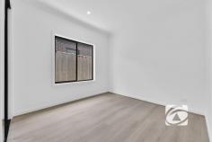 99 Athletic Cct Clyde VIC 3978 $680,000 - $748,000 Discover the perfect blend of contemporary comfort and thoughtful design in this brand-new residence, ideally suited for first-time buyers, astute investors, or those seeking a more manageable lifestyle. This impeccably crafted home welcomes you with four generously proportioned bedrooms, headlined by a luxurious master suite complete with a walk-in robe and private ensuite. The remaining three bedrooms feature built-in robes and are conveniently serviced by a stylish main bathroom and separate toilet. The heart of the home showcases a seamlessly integrated open-plan living space, where the lounge, dining, and kitchen areas flow effortlessly together, creating an inviting atmosphere for both everyday living and entertaining. The modern kitchen is a true highlight, boasting quality appliances, elegant stone benchtops, and abundant storage to meet all your culinary needs. Climate control is effortless year-round with central ducted air conditioning, while contemporary downlights illuminate every corner. A spacious laundry and low-maintenance backyard ensure practicality remains paramount, complemented by a single car garage with secure internal access. Located in the sought-after Pavilion Estate, this home positions you within easy reach of Casey Fields, reputable schools, childcare facilities, and other amenities. Families will appreciate the abundance of walking paths, playgrounds, parks, and sporting amenities right at your doorstep. This exceptional property represents outstanding value in today's market, offering a lifestyle defined by comfort, convenience, and contemporary appeal. Don't let this opportunity pass you by—arrange your private inspection today and experience firsthand what makes this residence truly special.