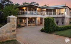 12 Nenagh Grove Waterford WA 6152 $2,000,000 Tucked away at the end of a quiet cul-de-sac facing and backing onto a tranquil nature reserve and Canning River, this spacious family residence offers an exceptional lifestyle setting on a super-sized 1,000 square metre lot in one of Waterford’s most peaceful and desirable locations.. Built by its current (and only) owner with meticulous attention to detail, this double brick home celebrates craftsmanship and family comfort in equal measure. With multiple living zones spread across two generous levels, there’s space here for every member of the family to live, relax, and grow. At the heart of the home, a striking central jarrah staircase and light-filled atrium create a warm sense of openness and connection. Families will appreciate the flexibility of three living areas, a separate games room, and a formal dining space ideal for gatherings. The fifth bedroom easily doubles as a home office or study, while custom timber work and stunning leadlight windows add character throughout. Outdoors, there’s just as much to love. The recently resurfaced concrete pool with new glass fencing and just poured liquid limestone provides a beautiful focal point for summer fun, while the alfresco offers plenty of space for weekend BBQs and entertaining. There’s also a sizeable shed/workshop and loads of secure paved parking – perfect for the family caravan AND a boat. Freshly painted inside, with new carpet to select areas and solid finishes built to last, this home is ready to welcome its next family and continue its legacy of care and craftsmanship. Property Highlights: • Huge 1,000m² lot at the end of a quiet cul-de-sac adjoining nature reserve and Canning River • Expansive internal layout with three living areas, games room, and formal dining • Fifth bedroom can easily function as a study or home office • Owner-builder, single owner – quality construction and timeless design • Clinker brick features with custom timber detailing and leadlight windows • Soaring central atrium and feature jarrah staircase • Western red cedar panelling to upstairs bedroom/office • Recently resurfaced concrete pool with new glass fencing and liquid limestone • Alfresco area for family gatherings • Double basins to both ensuite and main bathroom • Large, functional laundry with ample storage • East-facing wraparound balcony for morning coffees or sunset relaxation • Roof-top solar PV system • Fresh internal paint and new carpet to selected areas • Sizeable brick shed/workshop for hobbies or storage • Extensive paved area for secure off-street parking for a caravan, boat, or multiple vehicles Location Highlights: • Peaceful cul-de-sac position directly beside tranquil nature reserve and Canning River • Short stroll to George Burnett Park with its playgrounds and open green spaces • Walking distance to Curtin University and Waterford Plaza with cafés, restaurants, and 24-hour grocery shopping • Close to Aquinas College and Penrhos College • Short bike ride to Challenger Reserve • Easy access to the Canning River foreshore, cycle paths, and walking trails • Convenient connection to major transport routes and the freeway, just 10 minutes to the CBD