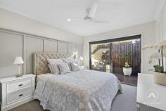 12 Kumbatine Street Pimpama QLD 4209 Welcome to 12 Kumbatine Street, a beautifully presented Plantation Homes build that perfectly blends modern comfort with family-friendly living in the heart of Gainsborough Greens. Built in 2018 and set on a 375m² block, this home has been thoughtfully designed to suit the busy lifestyle of Queensland families who value both style and convenience. Step inside and you’ll immediately feel the sense of space created by impressive 2.7m ceilings and hybrid flooring that flows through the open plan design. The gourmet kitchen, complete with stone benchtops, a 900mm cooktop, oven, and a walk-in pantry, is a dream for anyone who loves to cook or entertain. Overlooking the dining and living areas, the space seamlessly connects to the covered alfresco, making it easy to enjoy indoor-outdoor living and hosting all year round. Families will love the separate kids’ retreat, a bonus second living area that keeps everyone connected but gives the little ones their own space. All four bedrooms are fitted with built-in robes, while the master bedroom offers the luxury of a walk-in robe. The bathrooms have been designed with everyday families in mind, featuring stone benchtops and double vanities for that extra touch of elegance. Practicality hasn’t been overlooked either, with split system air-conditioning, a double garage, and the unbeatable convenience of being within walking distance to shops, schools, and everything that makes Gainsborough Greens such a sought-after area. Key Features – 375m² block built by Plantation Homes in 2018 – 4 bedrooms with built-in robes, master with walk-in robe – Open plan living and dining flowing to alfresco – Separate kids’ retreat for flexible family living – Kitchen with 900mm appliances, stone benchtops, and walk-in pantry – Bathrooms with double vanities and stone finishes – 2.7m ceilings and hybrid flooring throughout – Split system air-conditioning and double garage – Walking distance to local shops and schools This home is all about lifestyle-modern, low-maintenance, and ready for you to simply move in and enjoy.