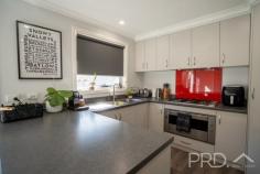4 / 63 Bundara Crescent Tumut NSW 2720 $610,000 Positioned in a quiet enclave just a few moments' drive from all major local amenities. This modern three-bedroom family home offers a sleek design, with open plan living and modern creature comforts, all complimented by ample space in the rear yard to entertain family and friends, also boasting dual side vehicle access. 4/63 Bundara Crescent is a fantastic low maintenance and modern design opportunity not to be missed. Do not be beaten by your competition, call today to book your inspection. Premiere Features: - King size master bedroom boasting triple built in robes, ceiling fan and ensuite - Ensuite with shower, toilet and single vanity - Two queen sized bedrooms, both with double built in robes and ceiling fans - Great size main bathroom with separate bath and shower, toilet and single vanity - Kitchen boasting gas cooktop, dishwasher, ample storage and bench space and double sink overlooking the rear yard - Open plan dining positioned directly off the kitchen with direct external access - Great size living area upon entry and serviced by ceiling fan and split system reverse cycle air conditioning - Internal laundry with ample storage and direct external access - Single garage with automatic roller door - Fully fenced and landscaped rear yard with vehicle access on both sides of the home, all complimented with established Manchurian pears that offer great privacy - Rainwater tank - Low maintenance front yard - Approximate 696m² allotment - Gas hot water connected - LED downlighting connected - Currently tenanted at $570 per week until April 2026 With ample opportunity in the rear yard for additional shedding or swimming pool. 4/63 Bundara Crescent is a sleek and modern designed family home with ample opportunity for growth. Do not miss your opportunity to secure such a fantastic opportunity.