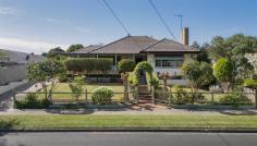 1A Melvin Street Frankston VIC 3199 $910,000 - $1,000,000 Set within picturesque established gardens and offering plentiful off-street parking, this character-rich residence reveals generous spaces for entertaining alongside serene private accommodation. Presenting an inviting opportunity for those who appreciate a touch of mid-century charm to sympathetically update with modern comforts, all while enjoying an exclusive and centrally located address. Timeless and warm interiors are anchored by solid timber floors, as formal living and dining sweeps towards a timber kitchen with upgraded appliances and an internal servery window that elegantly frames the soaring pitched ceilings gracing the family room. Complete with a freestanding gas log fireplace and split-system heating and cooling, this expansive rear living zone opens to a secure backyard, where an outdoor entertaining space with bar and second toilet brings added flexibility. With three bedrooms, a family bathroom, dedicated laundry, ducted heating, ample storage options, and a wide front verandah, the home is accompanied by a lengthy side driveway with access to a single carport, single garage, and additional off-street parking all secured by double gates. Comfortable for now yet holding the promise of potential, it sits on a large 650 sqm (approx.) allotment with a wide 19.4m frontage, inside the Golden Triangle of Frankston and the sought after Frankston High School zone. You will also find Frankston Foreshore, CBD, PARC Aquatic Centre, Chisholm TAFE and Frankston Train Station all within easy reach.