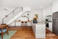6 Finniss Ct North Adelaide SA 5006 $990,000 - $1,089,000 Tucked quietly off Finniss Street within an exclusive court, this renovated townhouse offers the ideal lock-up-and-leave lifestyle in one of Adelaide’s most coveted city-fringe pockets. Perfect as a home base for the busy professional, a secure investment or potential Airbnb, every inch has been thoughtfully designed for comfort, light and effortless liveability. Step inside to the heart of the home where you’ll find a light-filled open plan kitchen, living and dining space that instantly feels warm and welcoming. Timber floors flow underfoot, while plantation shutters and French doors frame the courtyard beyond, filling the space with soft natural light. The kitchen impresses with sleek cabinetry, a generous island bench and walk-in pantry providing abundant storage, complemented by premium Smeg appliances and a Miele dishwasher. A clever under-stair nook offers a versatile space for a study or breakfast bar, while a discreet powder room adds thoughtful convenience for guests. Upstairs, two spacious bedrooms each enjoy their own bathroom, creating flexibility for guests or shared living. The master features a wall of built-in robes and a generous ensuite with bath, while the large main bathroom doubles as a laundry with concealed washer and dryer space. Enjoy living moments from Adelaide Oval, O’Connell Street, Melbourne Street and the CBD, with the Parklands forming your extended backyard. Wander to the British Hotel or the Lion Hotel for a relaxed meal in the sun or take advantage of nearby public transport and cycling trails connecting you seamlessly across the city. Zoned for North Adelaide Primary and Walkerville Primary, as well as Adelaide Botanic and Adelaide High Schools. Prestigious private options including Wilderness School, St Dominic’s Priory and St Peter’s Boys are all within easy reach. FEATURES WE LOVE • Built 2002, renovated 2019 • Quiet court off Finniss Street • Ideal city pad, investment or potential Airbnb • Light-filled open plan living and dining • Sleek kitchen with Smeg appliances & Miele dishwasher • Island bench, walk-in pantry & understairs study nook • French doors to private courtyard • Guest powder room on lower level • Two bedrooms, each with own bathroom • Master with built-in robe & ensuite • European laundry in contemporary main bathroom • Ducted reverse-cycle air conditioning & ceiling fans • Plantation shutters throughout • Timber floors downstairs, carpet upstairs • Intercom & single car garage LOCATION • Unbeatable city-fringe setting • Enjoy a lifestyle of cafés, culture and green open space all at your doorstep • Walk to O’Connell Street, Melbourne Street, Adelaide Oval and the CBD • Moments from the British and Lion Hotels for casual dining options • Easy access to Adelaide’s universities and public transport SCHOOL ZONES • Zoned for North Adelaide and Walkerville Primary Schools • Zoned for Adelaide Botanic High School and Adelaide High School • Close to Wilderness School, St Dominic’s Priory College and St Peter’s Bo