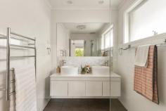 2 Melaleuca Court Frankston VIC 3199 $790,000 - $869,000 Tucked away in a quiet, family-friendly court in the heart of Frankston, this beautifully updated three-bedroom, two-bathroom home blends style, space and everyday comfort. Ideal for families, first-home buyers and investors alike, it's within walking distance of local schools, parks, shops and public transport, offering convenience and low-maintenance living. Step inside to discover two spacious living zones, perfect for relaxing with family or entertaining friends. The renovated kitchen forms the heart of the home, featuring modern appliances, a walk-in pantry, generous storage and sleek finishes. Both bathrooms have been tastefully updated, creating a fresh, contemporary feel throughout. All three bedrooms are well-sized with built-in robes, while the master suite boasts a private ensuite. Ducted heating, ceiling fans, a split-system air conditioner and abundant natural light enhance comfort year-round. Outdoors, a spacious deck flows to a sun-filled backyard with a fire pit, ideal for entertaining or unwinding under the stars. A double garage provides secure parking and extra storage. Set in a peaceful court, this home offers tranquility and convenience close to schools, shopping precincts, the beach and freeway access. This is your opportunity to secure a quality home in one of Frankston's most sought-after pockets. Impeccably presented and move-in ready, every detail has been taken care of.