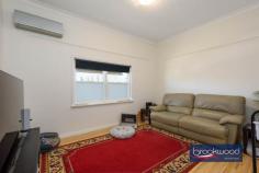4 Afric St Middle Swan WA 6056 $649,000 An opportunity where family sanctuary meets strategic investment on a substantial 971 sqm block. This original 1950s residence offers the immediate rewards of generous family living alongside the long-term prospects of R20 development potential, subject to necessary approvals. An enviable position transforms a spacious family home into a truly strategic acquisition. Currently tenanted until April 2026. 3 bedrooms 1 bathroom 1953-built brick and tile Lounge sunroom & activity Updated central kitchen Sep games room and study High ceilings throughout Big backyard level fenced Pwd weatherboard garage 971 sqm block zoned R20 Behind a screen of clipped Lilly Pillys, this charming home welcomes you through a traditional front porch featuring period-defining painted concrete flooring. A small entrance hall leads seamlessly to the generously proportioned principal bedroom, complete with split-system air conditioning and a ceiling fan for year-round comfort. The formal lounge, also equipped with split air-conditioning, provides a sophisticated space for relaxation. At the same time, the spacious family bathroom, conveniently located near the principal bedroom, serves the home with both a bathtub and separate shower facilities. Central to the floorplan is an updated kitchen offering ample under-bench storage, an electric oven, and a gas cooktop – perfect for both everyday meals and entertaining. High ceilings throughout enhance the sense of space and airiness, creating an immediately welcoming atmosphere. What was originally the rear verandah is now transformed into a central, east-facing sunroom that floods the interior with natural light. Bedrooms positioned at either end of this central space create a wonderful sense of connection with the outdoors and give kids a space of their own. Adjoining the sunroom is a large, multi-use space featuring dual-aspect glazing. This light-filled room serves beautifully as a family room, games area, or additional entertaining space. Direct access to the fully fenced backyard creates seamless indoor-outdoor living. The east-facing backyard is a family paradise, extending from a central paved patio to a generous level lawn area. Mature fruit trees provide both shade and seasonal produce, while the original washhouse and powered weatherboard garage add character and storage. Practical features include high gates providing drive-in access to the garage, plus additional off-street parking at the front of the property – ensuring convenience for multiple vehicles. Currently tenanted until April 2026, this property offers immediate rental returns for investors, providing time to explore the development possibilities that the R20 zoning presents. Whether you’re seeking a comfortable family residence, a sound investment, or a development opportunity, this exceptional property delivers on all fronts. This enviable address places you moments from quality schools, sporting facilities, and the vibrant heart of local shops and services. The nearby train station ensures effortless connectivity, making this an ideal choice for growing families or astute investors.