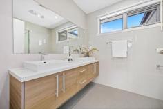 5/1 Joyce Court Doncaster VIC 3108 $1,200,000-$1,300,000 A beautifully designed townhouse that perfectly balances modern living with comfort and style. This exceptional property features 4 spacious bedrooms and 3 well-appointed bathrooms, making it an ideal family home or an investment opportunity in one of Melbourne's most sought-after suburbs. Key Features: - Spacious Living: The open-plan living and dining area is bathed in natural light, providing a warm and inviting atmosphere. The elegant hardwood flooring complements the contemporary interior design, making it perfect for both relaxation and entertaining. - Gourmet Kitchen: The heart of the home boasts a stylish kitchen equipped with a generous kitchen island, modern appliances, and ample storage space. Whether you're hosting a dinner party or enjoying a quiet meal, this kitchen is designed for both functionality and aesthetics. - Luxurious Bedrooms: Retreat to the generous bedrooms, each designed with comfort in mind. The master suite features an ensuite bathroom, providing a private oasis for relaxation. - Outdoor Oasis: Step outside to discover a beautifully landscaped backyard, perfect for outdoor entertaining or enjoying a quiet moment in nature. The lush grass and carefully selected plants create a serene environment for family gatherings or peaceful evenings under the stars. - Convenient Amenities: With a double garage, you'll have plenty of space for vehicles and storage. The property is also conveniently located near local parks, shopping centers, and public transport, ensuring everything you need is just a stone's throw away. - Architectural Elegance:This townhouse stands out with its modern architecture, featuring clean lines and thoughtful design elements that enhance both its functionality and aesthetic appeal.