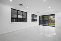 62A Longstaff Avenue CHIPPING NORTON NSW 2170 Welcome to this beautiful, brand-new 5-bedroom family home, thoughtfully designed to combine space, comfort, and modern style. Perfectly set on a 353sqm block in a quiet, family-friendly street, this residence offers everything you need for relaxed living and effortless entertaining. Key Features: - Five generous bedrooms, including a master suite with walk-in robe and ensuite - Modern kitchen with stone benchtops, quality appliances, a walk-in pantry, and plenty of storage for the family chef - Spacious open-plan living and dining that flows outdoors to the covered entertaining area - High ceilings (2.7m both upstairs and downstairs) for a bright and airy feel throughout - Stylish bathrooms and ensuites with floor-to-ceiling tiling - Ducted air-conditioning to keep the whole family comfortable year-round - Top-quality Clipsal electricals and LED lighting throughout - Secure garage plus additional off-street parking - Low-maintenance backyard, perfect for kids to play or weekend BBQs - Upstairs landing area offering extra living space for a study, play zone, or quiet retreat Close to local schools, shops, public transport, and the scenic Chipping Norton lakes, this home puts everything your family needs within easy reach.
