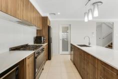 37 Tomerong Street Tullimbar NSW 2527 $1,200,000 - $1,300,000 Welcome to a place where modern comfort meets relaxed living. This beautiful family home has been thoughtfully designed for those who love to gather, celebrate, and create lasting memories both indoors and out. With spectacular escarpment views as your backdrop, every day here feels a little more special. Step outside and unwind in your own private sanctuary. The sleek black pool, complete with electric heating, invites year-round enjoyment. Surrounded by easy-care landscaping, the outdoor spaces are made for relaxing afternoons, long summer evenings, and entertaining friends without the fuss of constant upkeep. Inside, high ceilings and three separate living areas create a warm sense of space for the whole family to spread out and enjoy. The oversized main bedroom is a true retreat, capturing stunning escarpment views, while the bathrooms offer indulgent touches like oversized showers, a freestanding bath and elegant timber vanities. The kitchen is where everyone will want to gather. With a five-burner gas cooktop, walk-in pantry, 20mm stone benchtops, and plenty of preparation space, it's perfect for both everyday meals and those big celebrations where everyone comes together. This home has been designed with ease in mind. A 14kW solar system with Tesla 13kW battery ensures energy efficiency, while two-zone ducted air-conditioning keeps every room just the right temperature no matter the season. KEY FEATURES • 4 spacious bedrooms + dedicated home office/5th bedroom • Oversized main suite with escarpment views • 3 living areas for family flexibility • Designer bathrooms with premium finishes • Sleek black inground pool that is heated • 14kW solar + Tesla 13kW battery storage • Low-maintenance outdoor design This is more than a house, it's a place to slow down, celebrate with loved ones and soak up the beauty of your surroundings.