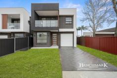 62A Longstaff Avenue CHIPPING NORTON NSW 2170 Welcome to this beautiful, brand-new 5-bedroom family home, thoughtfully designed to combine space, comfort, and modern style. Perfectly set on a 353sqm block in a quiet, family-friendly street, this residence offers everything you need for relaxed living and effortless entertaining. Key Features: - Five generous bedrooms, including a master suite with walk-in robe and ensuite - Modern kitchen with stone benchtops, quality appliances, a walk-in pantry, and plenty of storage for the family chef - Spacious open-plan living and dining that flows outdoors to the covered entertaining area - High ceilings (2.7m both upstairs and downstairs) for a bright and airy feel throughout - Stylish bathrooms and ensuites with floor-to-ceiling tiling - Ducted air-conditioning to keep the whole family comfortable year-round - Top-quality Clipsal electricals and LED lighting throughout - Secure garage plus additional off-street parking - Low-maintenance backyard, perfect for kids to play or weekend BBQs - Upstairs landing area offering extra living space for a study, play zone, or quiet retreat Close to local schools, shops, public transport, and the scenic Chipping Norton lakes, this home puts everything your family needs within easy reach.