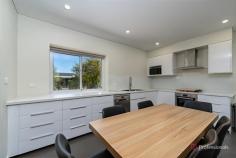 1/20 Mayfield Avenue Armidale NSW 2350 $500,000 - $550,000 Positioned in the sought-after North Hill area, this modern three-bedroom townhouse presents excellent opportunity for both owner-occupiers and investors seeking a low-maintenance property. Set over two levels, the home features a practical and contemporary design. The ground floor offers a single lock-up garage with internal access, a laundry, and an open-plan living, dining, and kitchen area. The stylish kitchen is equipped with wraparound benches, a double sink, dishwasher, and ample storage, flowing seamlessly into a tiled living space complete with reverse cycle air conditioning for year-round comfort. Upstairs, you’ll find three well-proportioned bedrooms – all with built-in robes. The master bedroom boasts a walk-in robe and private ensuite, while the remaining bedrooms are serviced by a modern main bathroom and separate toilet. Outside, enjoy the privacy of a low-maintenance courtyard – perfect for relaxed outdoor living. The townhouse has high ceilings that allow ample natural light to flood the generous spaces. Double glazing and high insulation levels lower the energy costs to keep you warm in winter and cool in summer.