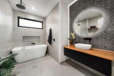 37A Redgum Drive Mansfield VIC 3722 $800,000 - $880,000 This stunning residence captures the perfect balance of space, style, and effortless low-maintenance living. Abundant natural light filters through expansive north-facing windows, accentuating the soaring ceilings and sophisticated, contemporary interiors. Designed by Ben Willick and built by Wilkon Building, this home showcases exceptional craftsmanship, thoughtful design, and a seamless connection between indoor and outdoor living. At its heart lies a beautifully proportioned open-plan kitchen, living, and dining area - where double stacker doors open to a covered alfresco, ideal for relaxed entertaining. The designer kitchen impresses with a stone island bench, 900mm oven, gas cooktop, and integrated dishwasher. The master suite offers a private retreat with a walk-in robe and luxurious ensuite, complemented by two additional bedrooms, a sleek main bathroom, and a convenient powder room. Additional features include double glazing throughout, zoned heating and cooling, a drive-through garage with internal access, and secure storage. Set on a landscaped 371m² (approx.) allotment, the property features a charming, low-maintenance garden - a tranquil spot to potter, unwind, and enjoy a touch of greenery without the upkeep. Perfectly positioned just moments from the Botanic Gardens and only minutes from High Street cafés, restaurants, and shops, this home offers an enviable lifestyle of comfort and convenience. Book your inspection today and experience the lifestyle you've been dreaming of.