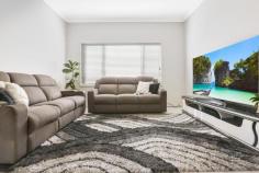 37 Tomerong Street Tullimbar NSW 2527 $1,200,000 - $1,300,000 Welcome to a place where modern comfort meets relaxed living. This beautiful family home has been thoughtfully designed for those who love to gather, celebrate, and create lasting memories both indoors and out. With spectacular escarpment views as your backdrop, every day here feels a little more special. Step outside and unwind in your own private sanctuary. The sleek black pool, complete with electric heating, invites year-round enjoyment. Surrounded by easy-care landscaping, the outdoor spaces are made for relaxing afternoons, long summer evenings, and entertaining friends without the fuss of constant upkeep. Inside, high ceilings and three separate living areas create a warm sense of space for the whole family to spread out and enjoy. The oversized main bedroom is a true retreat, capturing stunning escarpment views, while the bathrooms offer indulgent touches like oversized showers, a freestanding bath and elegant timber vanities. The kitchen is where everyone will want to gather. With a five-burner gas cooktop, walk-in pantry, 20mm stone benchtops, and plenty of preparation space, it's perfect for both everyday meals and those big celebrations where everyone comes together. This home has been designed with ease in mind. A 14kW solar system with Tesla 13kW battery ensures energy efficiency, while two-zone ducted air-conditioning keeps every room just the right temperature no matter the season. KEY FEATURES • 4 spacious bedrooms + dedicated home office/5th bedroom • Oversized main suite with escarpment views • 3 living areas for family flexibility • Designer bathrooms with premium finishes • Sleek black inground pool that is heated • 14kW solar + Tesla 13kW battery storage • Low-maintenance outdoor design This is more than a house, it's a place to slow down, celebrate with loved ones and soak up the beauty of your surroundings.