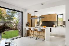 3/8 Cecil Street Frankston VIC 3199 $810,000 - $890,000 Fusing contemporary design with the picturesque beauty of Frankston beachside, this luxurious townhouse embodies a fresh, high-spec take on coastal living in one of the area's most treasured pockets. Owning an off-street position, it weaves natural light across a thoughtful dual-storey layout mere moments from George Pentland Botanic Gardens, University Hospital and Frankston High School. Elevated ceiling heights veil an open-plan ground floor, where spacious living and dining proportions cater to every mode of entertainment. Accompanied by a stone-finished kitchen outfitted with 900mm Baumatic appliances, including a dishwasher, the social hub stretches through a glass slider to reach a secure yard that demands minimal to no maintenance. Bridged to the accommodation by a stunning architectural staircase, three robed bedrooms and two bathrooms sit elevated and totally private. Among them, the master bedroom with mirrored robes, indulges couples with their own private ensuite featuring a dual vanity with underbench storage and oversized shower with rail head and wall niche. Comprehensively upgraded with ducted refrigerated air-conditioning and gas heating, a laundry, powder room, water tank, rear garden shed, and double garage with internal access. Within FHSZ, find Overport Road Primary, Monash University, and Bayside Shopping Centre a short drive from home.