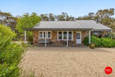 120 Miners Hut Road Chewton Bushlands VIC 3451 $880,000 - $950,000 ENTER VIA SPARKS AVENUE > SPARKS ROAD > MINERS HUT ROAD > WALLABY CRESCENT There's a moment each day when Chewton Bushlands holds its breath. The sun slips low and the sky throws every shade of apricot and mauve across the ridgelines. That's Ukamirra - "sunset" in an Australian Aboriginal language - a fitting name for this stone cottage on a private hilltop, day after golden day. Set on approximately 7 acres of native bushland, on the Melbourne side of Castlemaine (10 mins away), Ukamirra feels like a Swiss alpine refuge reimagined for central Victoria. Hand laid local stone, a giant old oak on the house platform and long views that roll all the way to Mount Macedon and Mount Franklin. Inside, the mood is warm and honest. A comfy lounge anchors the home, with a separate kitchen/dining hub for slow breakfasts and long, chatty dinners. There are 3 bedrooms plus a kids' mezzanine for cubby like dreams and a bright bathroom. Ukamirra runs beautifully off-grid, just as most homes in Chewton Bushlands do. The system is clever, so you can focus on the sunsets, not the switches. The stone keeps things naturally cool in summer with pedestal fans on hand, while winter is well sorted with two wood fires and a hallway gas heater to take the chill off. Why you'll love it: • Hilltop position with panoramic views to Mount Macedon and Mount Franklin • Beautiful local stone cottage with the romance of an alpine lodge and the soul of central Victoria • Giant oak shading the house platform - breakfast, lunch and dinner outdoors • Starry-night BBQs, winter firelight and the daily theatre of sunset that inspired the home's name The details: • Land: approximately 3.07 hectares (approx. 7.5 acres) • Heating/Cooling: 2 Nectre wood fires (lounge and kitchen), hallway gas heater, stone construction that holds summer cool, flyscreens throughout • Power: off-grid system with 4.5 kW Selectronic inverter, 12 x 400Ah batteries, 8 x 200 W solar panels and backup:8 kW diesel generator • Water: approx. 25,000 litre house tank • Carport • Setting: nature reserve along the eastern boundary and a friendly, private neighbourhood Wildlife are your closest neighbours. Expect kangaroos at dawn, a chorus of native birds and the soft hush of the bush. On hot days, pack the swimming noodles and wander down to Golden Point Reservoir - the locals' lake - just 7 minutes away to float with ducklings and reset. Ukamirra is a quiet, creative hideaway with proper views and a deep sense of calm. Come late afternoon, when the light softens and the ridgelines turn violet, you'll understand why the name fits like a glove. This is a home for sunset collectors, stargazers and anyone who believes life is better when it's grounded in nature.