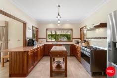 142 Richards Road Castlemaine VIC 3450 $1,250,000 - $1,350,000 If your dream brief reads kids upstairs, parents' retreat, pets, pony and pizza nights under the stars, this one ticks the lot. Set privately across approx. 2.5 acres of park like grounds with access to town water, this 5 bedroom double storey home is made for hide-and-seek and Sunday cricket. Inside, every window frames the garden like living art. A formal entry leads to a generous lounge with a bay window and sliding doors to a sunny north facing courtyard. A light filled north facing sunroom is your quiet corner for books, jigsaw puzzles and winter sunshine. The dining room opens to a supersized 13m x 7.4m alfresco - think long tables, fairy lights and an outdoor kitchen ready to go with hot and cold water already plumbed. The kitchen is family ready with a Smeg 900 mm freestanding oven, 2 drawer dishwasher, plumbed fridge, walk-in pantry and wrap around bench for homework and taste testing. A powder room, walk-in linen, full laundry and a flexible fifth bedroom or home office with its own entrance complete the ground floor - ideal for multi-generational living or private consults. Upstairs, a central sitting area looks over the gardens. The main bedroom features a walk-in robe and ensuite. 3 more bedrooms each have walk-in robes and leafy views, while the family bathroom brings a spa bath, shower, vanity and a separate toilet. Comfort is covered with evaporative cooling, ground-floor in-slab heating, split systems, ceiling fans and a handy laundry chute. Outside is where the magic happens. A circular drive sweeps to a 6m x 6m double garage with direct alfresco access for easy unloads. The rear garden blends into a whimsical "secret garden" of perennials, plus a fire pit zone for marshmallows and stargazing. Kids can race the dog across lush lawns before heading to the paddock - protected by kangaroo and rabbit-proof fencing. For tinkerers and toy-collectors, there's serious shedding: a 9m x 13.5m garage/workshop for the car enthusiast, a 6m x 9m machinery shed, plus side driveway access with a secure gate and room for the caravan, boat or horse float. The approx. 1 acre fenced paddock with established gums and chicken pen invites ponies, alpacas or a hobby farm chapter. On Richards Road you'll also find the Castlemaine Pony Club and there's easy access to Walmer Forest Reserve with around 60 km of singletrack for riding and adventure. All of this is less than 2 minutes from Castlemaine's cafes, schools, station and the Botanical Gardens when you need to reconnect. Grand living with heart - this is a home that feels like the beginning of a very good story